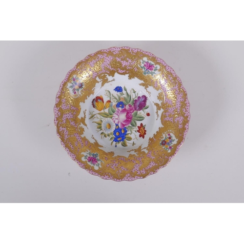 169 - A continental Sevres style pink ground porcelain dish with floral decoration, gilt highlights and br... 