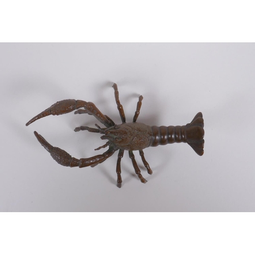 170 - A Japanese style bronze okimono crayfish, impressed mark to tail, 10cm long