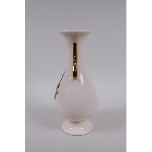 171 - A Chinese blanc de chine porcelain vase with gilt handles and raised prunus  decoration, 26cm h... 