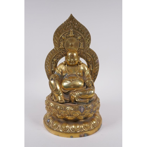 175 - A Chinese gilt bronze figure of Buddha seated on a lotus throne, 4 character mark to base, 29cm high