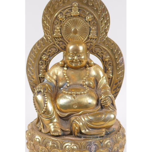 175 - A Chinese gilt bronze figure of Buddha seated on a lotus throne, 4 character mark to base, 29cm high