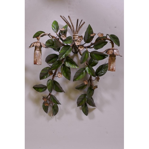 176 - A pair of painted metal two branch wall sconces of naturalist form, 48cm long