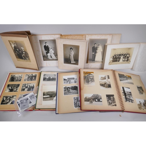 177 - A collection of Japanese early C20th and later photographs and photo albums of social historical int... 