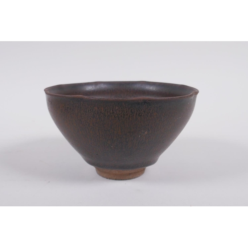 183 - A Chinese Jian kiln bowl with lobed rim and hares fur glaze, 13cm diameter