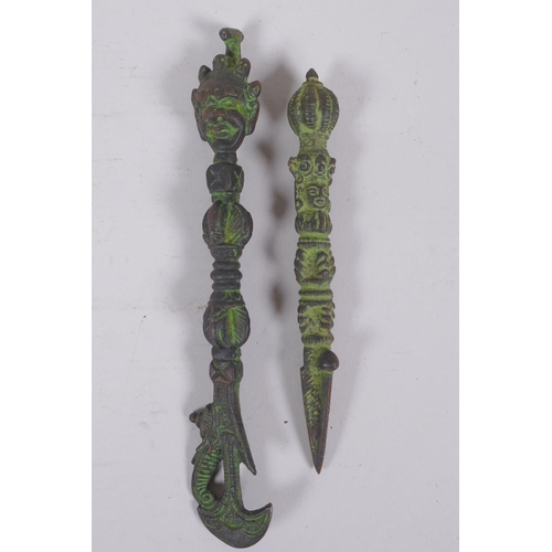 184 - A Tibetan ornamental bronze phurba and a similar kartika, longest 19cm