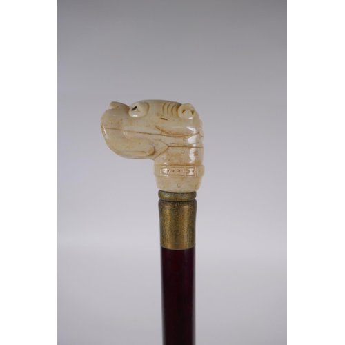 199 - A bone handled walking stick carved in the form of a dog's head, 90cm long