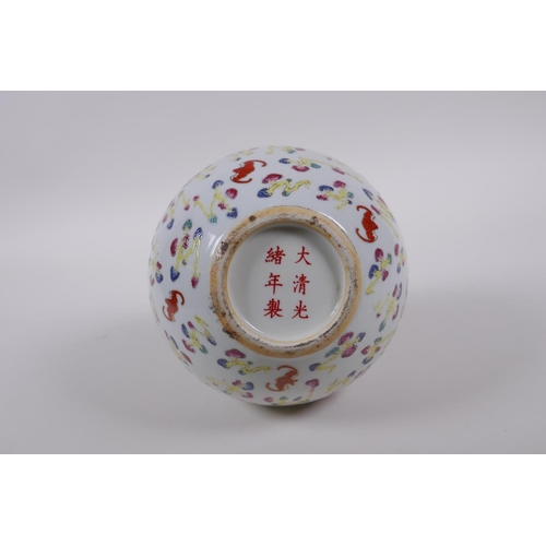 205 - A Chinese polychrome porcelain bottle vase with all over bat decoration, Chinese GuangXu 6 character... 