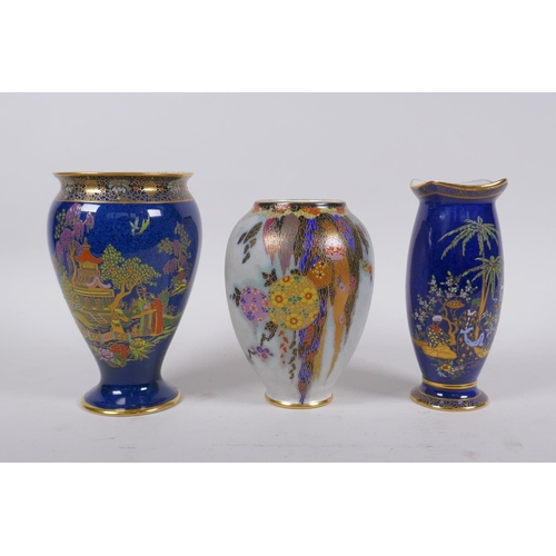 218 - Two Crown Devon porcelain vases with polychrome chinoiserie decoration, a Carlton ware vase with pol... 