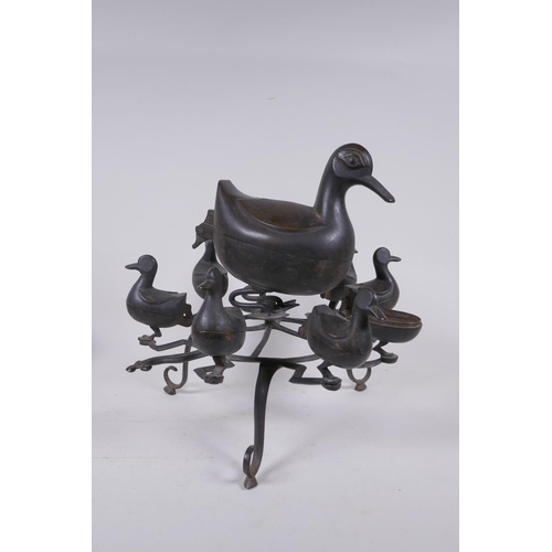 224 - An Indo Persian bronze spice box in the form of birds, 28cm high, 30cm diameter