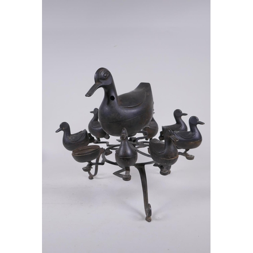 224 - An Indo Persian bronze spice box in the form of birds, 28cm high, 30cm diameter