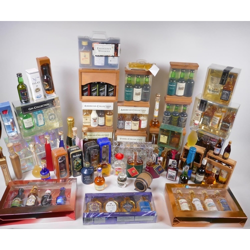 226 - A collection of spirit miniatures, gift sets and singles, including whisky, vodka, brandy, port etc