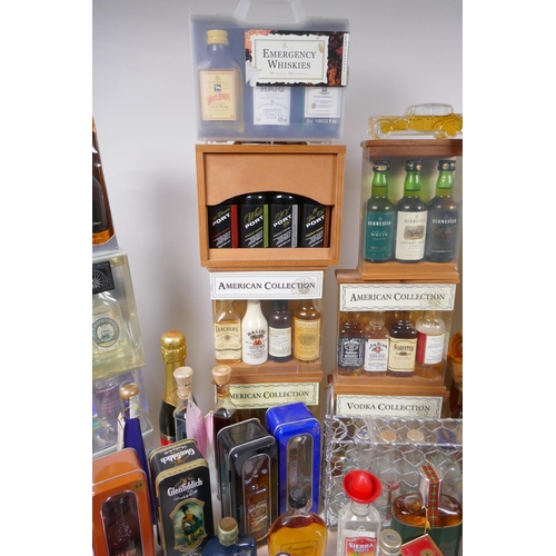 226 - A collection of spirit miniatures, gift sets and singles, including whisky, vodka, brandy, port etc