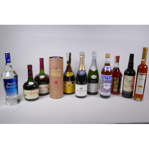 227 - A collection of eleven bottles of spirits and wine, to include Cardinal Mendoza brandy, Courvoisier,... 