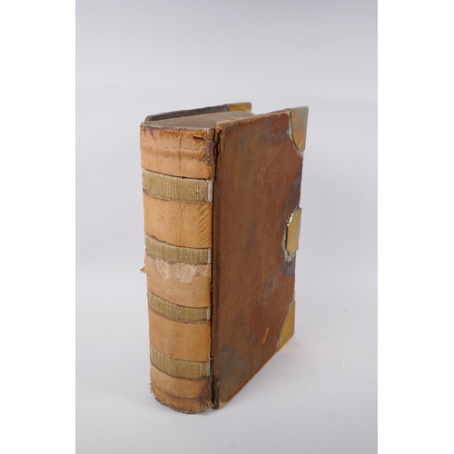 237 - An antique leather bound bank ledger with brass mounts and a Bramah of London lock, lacks key, 28 x ... 