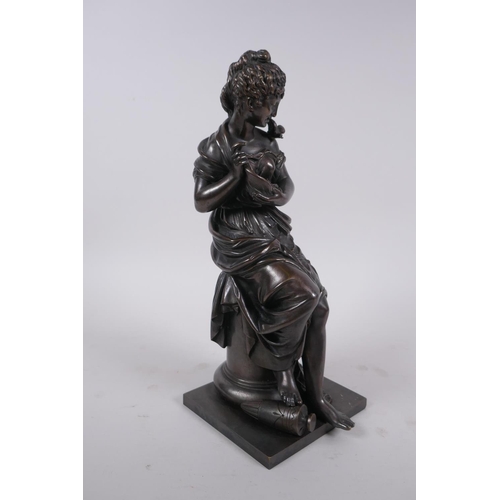 24 - After Emile Bruchon, a late C19th/early C20th French bronze of a seated woman holding a nest of fled... 