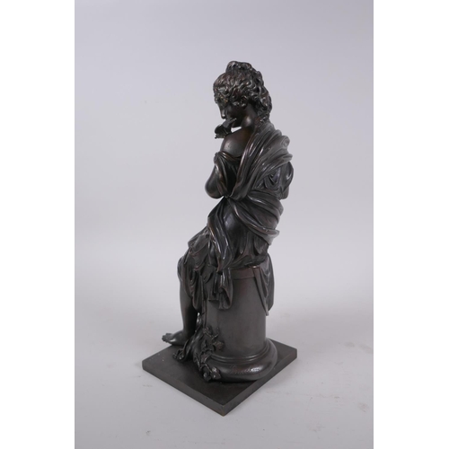 24 - After Emile Bruchon, a late C19th/early C20th French bronze of a seated woman holding a nest of fled... 