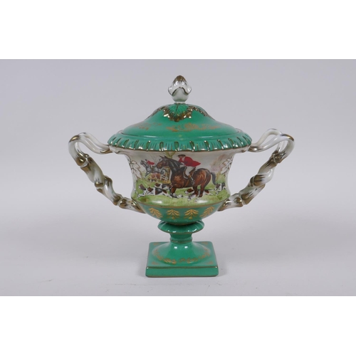 246 - A continental porcelain urn and cover with two handles, decorated with a hunt scene, 20cm high