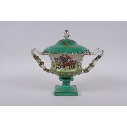 246 - A continental porcelain urn and cover with two handles, decorated with a hunt scene, 20cm high