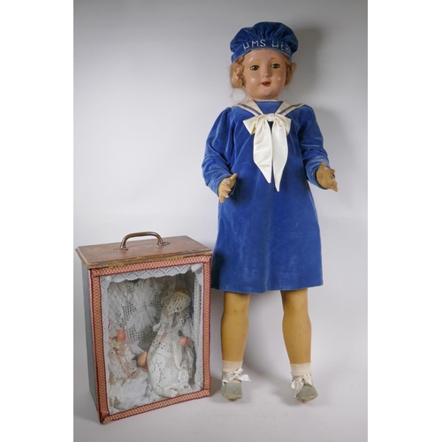 249 - A vintage 30s/40s life size lacquered wood walking doll in 'HMS Hero' clothing, with brown sleeping ... 