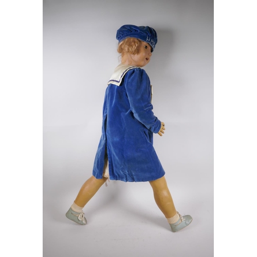 249 - A vintage 30s/40s life size lacquered wood walking doll in 'HMS Hero' clothing, with brown sleeping ... 