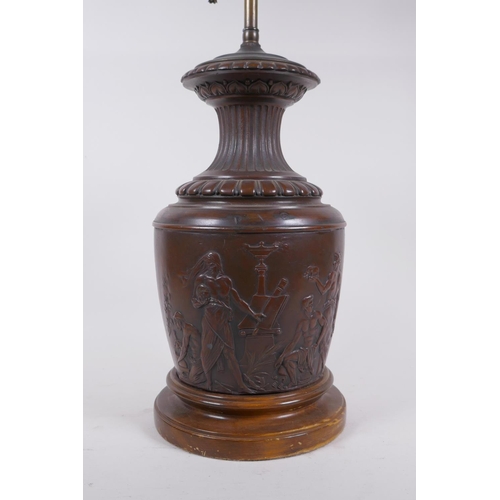 250 - Emile Louis Picault, (French, 1833-1915), an antique bronze urn with raised classical figural decora... 