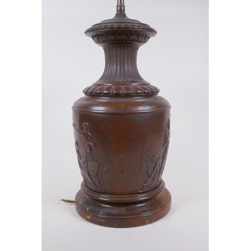 250 - Emile Louis Picault, (French, 1833-1915), an antique bronze urn with raised classical figural decora... 