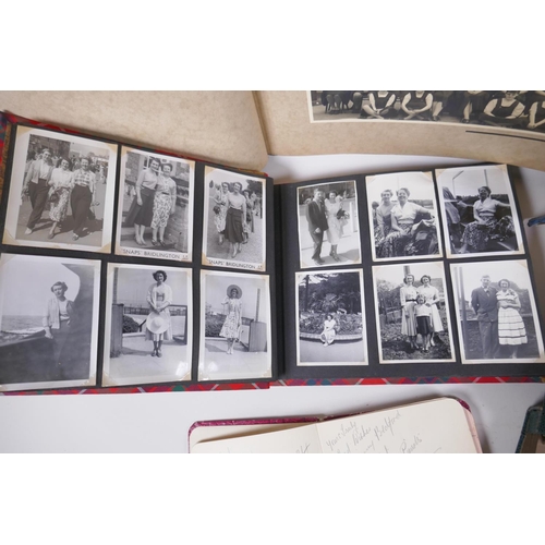 251 - A collection of early C20th photo albums, postcard albums and autograph books, of social historical ... 