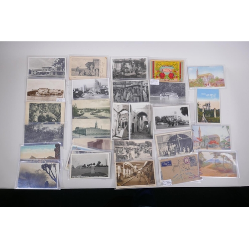 254 - A quantity of late C19th and C20th world postcards including Uganda, Uruguay, Pakistan, Zanzibar, Mo... 