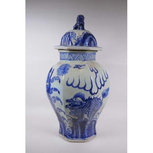 263 - A Chinese blue and white porcelain jar and cover of hexagonal form decorated with a kylin in a lands... 