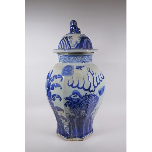 263 - A Chinese blue and white porcelain jar and cover of hexagonal form decorated with a kylin in a lands... 