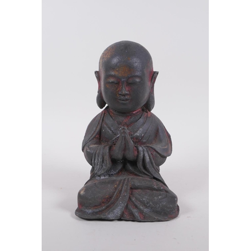 265 - A Chinese bronze figure of Buddha seated in prayer, 19cm high