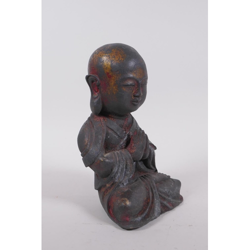 265 - A Chinese bronze figure of Buddha seated in prayer, 19cm high