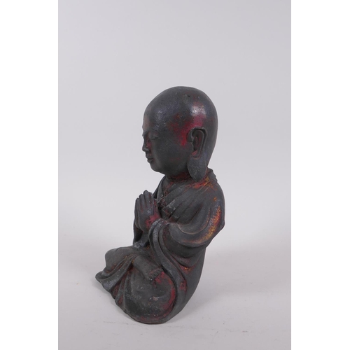 265 - A Chinese bronze figure of Buddha seated in prayer, 19cm high