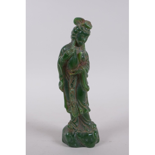 268 - A Chinese reconstituted green hardstone figure of Quan Yin, 20cm high