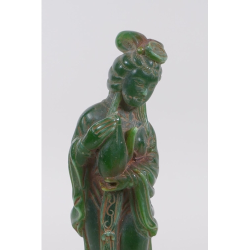 268 - A Chinese reconstituted green hardstone figure of Quan Yin, 20cm high