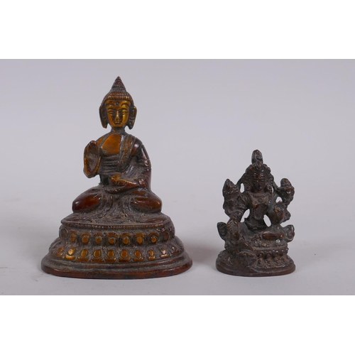 273 - A Sino Tibetan bronze figure of Buddha, and a smaller bronze figure of a female deity, largest 9cm h... 