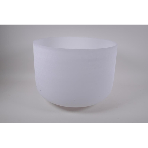 280 - A large crystal singing bowl with sand blasted exterior and polished interior, with fabric wrapped h... 