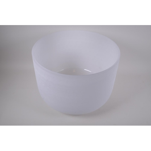 280 - A large crystal singing bowl with sand blasted exterior and polished interior, with fabric wrapped h... 