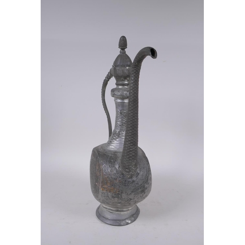 281 - An Iranian white metal ewer with engraved decoration, 39cm high