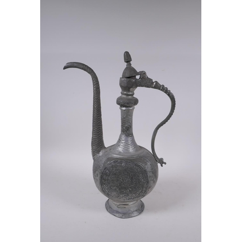 281 - An Iranian white metal ewer with engraved decoration, 39cm high