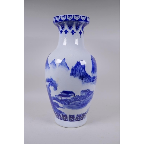 285 - A Chinese blue and white porcelain vase decorated with a riverside landscape, 45cm high