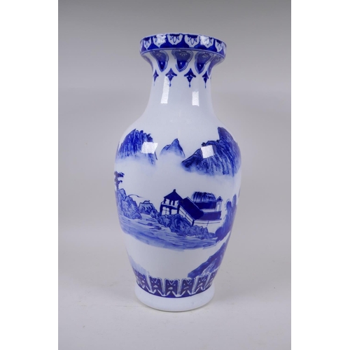 285 - A Chinese blue and white porcelain vase decorated with a riverside landscape, 45cm high