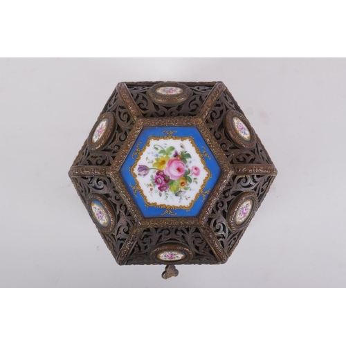 3 - A C19th French pierced ormolu jewellery casket of hexagonal form, with inset Sevres porcelain floral... 