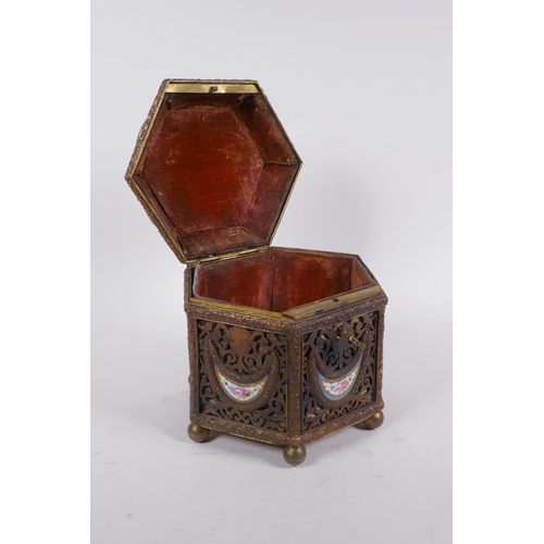 3 - A C19th French pierced ormolu jewellery casket of hexagonal form, with inset Sevres porcelain floral... 