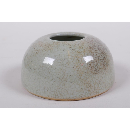 303 - A Chinese crackleware ink pot of domed form, 9cm diameter