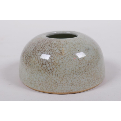 303 - A Chinese crackleware ink pot of domed form, 9cm diameter