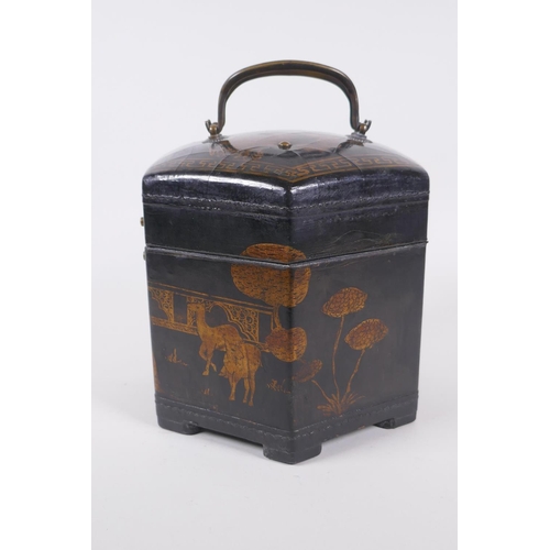 31 - A Chinese black lacquer caddy of hexagonal form with gilt chinoiserie decoration and brass mounts, 1... 