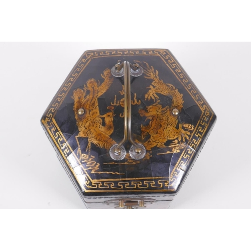 31 - A Chinese black lacquer caddy of hexagonal form with gilt chinoiserie decoration and brass mounts, 1... 