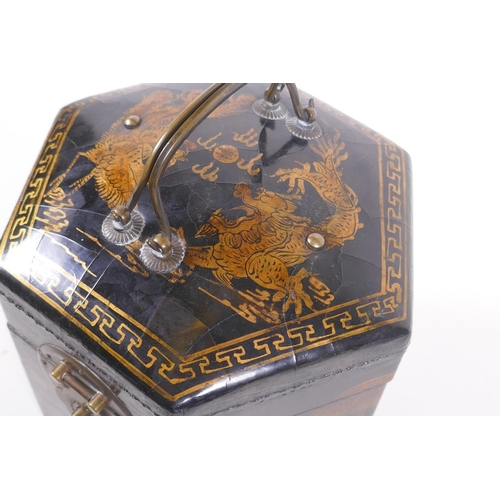 31 - A Chinese black lacquer caddy of hexagonal form with gilt chinoiserie decoration and brass mounts, 1... 