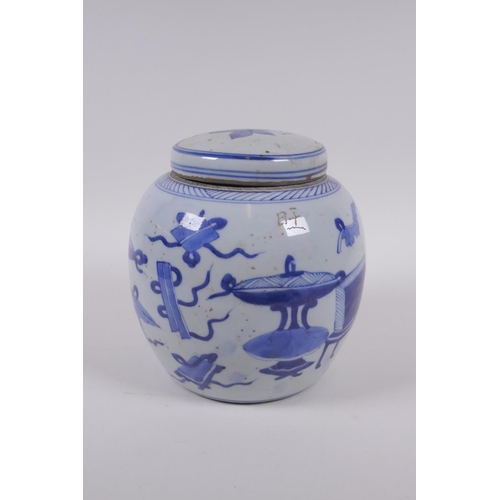 33 - A late C19th/early C20th Chinese blue and white porcelain ginger jar and cover, decorated with objec... 